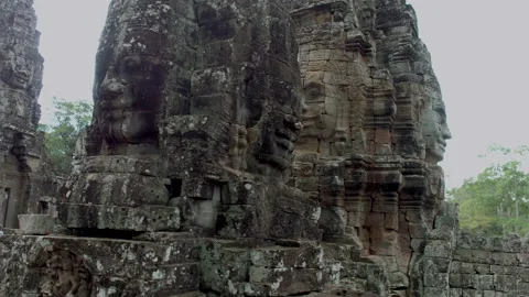 Large Stone Faces On The Towers At The Bayon Temple. Cambodia Vídeo Stock 134616335