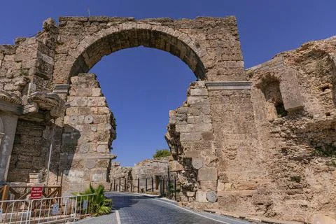 Large stone gate next to Vespasian Fountain in Side, Turkey Stock Photos