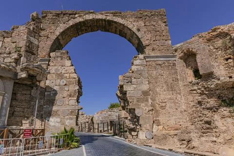 Large stone gate next to Vespasian Fountain in Side, Turkey Stock Photos