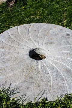 Large stone millstone from the mill Stock Photos