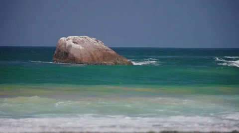 A large stone in the sea bay Stock Footage 25129363