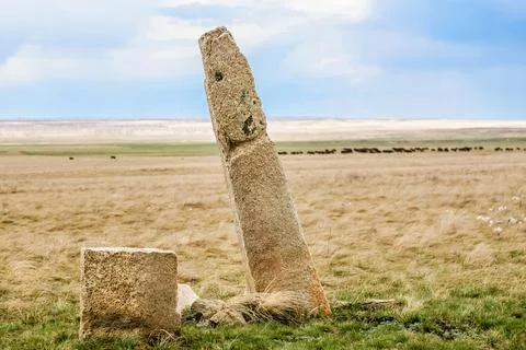 A large stone is sitting in a field in Arkaim Ural Russia Stock Photos