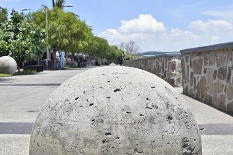 Large Stone Sphere on the Malecon of Cuexcomatitlan, Jalisco, Mexico Stock Photos