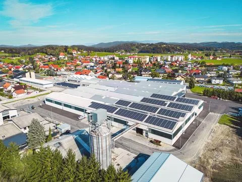 Large storage facility with solar panels on the roof top somewhere in the Stock Photos