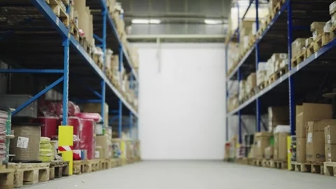 Large storage room warehouse with shelves organized for industrial inventory  Stock Footage 332072645