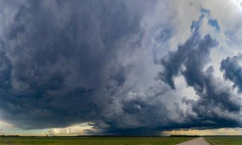 A large storm cloud with a raindrop Foto stock