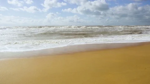 Large storm waves break about sand Stock Footage 81967191
