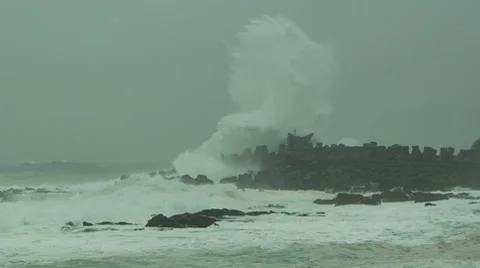 Large Storm Waves Crash Into Sea Defense Stock Footage