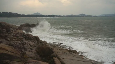 Large storm waves crashing on rocks in slow motion Stock Footage 111470429