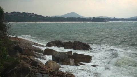 Large storm waves crashing on rocks in slow motion Stock Footage 111470460