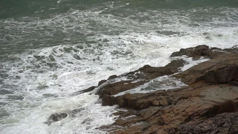 Large storm waves crashing on rocks in slow motion Stock Footage 111471210
