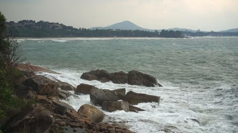 Large storm waves crashing on rocks in slow motion Stock Footage 111471448