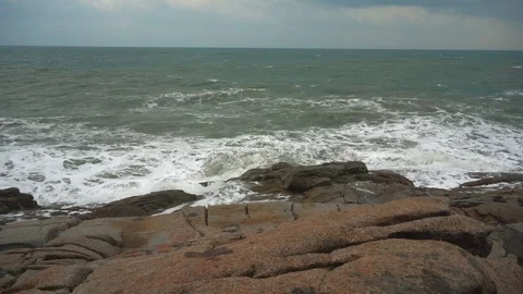 Large storm waves crashing on rocks in slow motion Stock Footage 111471502