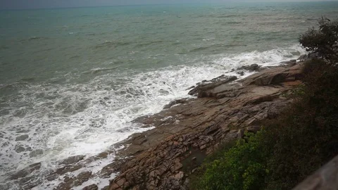 Large storm waves crashing on rocks in slow motion Stock-Footage 111471538