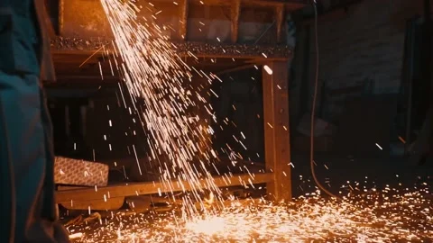 A large stream of sparks flying from oxy-fuel metal cutting. Stock Footage 225462129