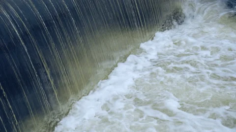 A large stream of water pours down Stock Footage 124608455