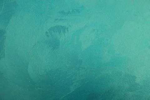 Large strokes of paint on a plastered wall, marble venetian plaster, pastel b Stock Photos