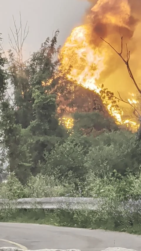 Large Structure Catches Fire in Port Maitland, Ontario, Port Maitland, Ontario,  Stock Footage 340677330