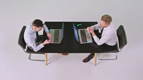 In a large studio with the white background manager and office worker working Video stock 131562766