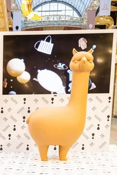 A large stuffed llama is on display in a store Stock Photos