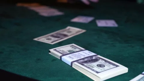 A large sum of money is on the table. Casino, bets Stock Footage 256902995