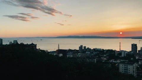 A large sun globe is visible above the sea surface. Beautiful sunset on the sea. Stock Footage 282710035