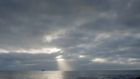 A large sunbeam over the ocean in Cornwall, England. Stock Footage 128192785