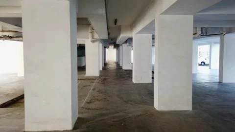 Large support pillars of residential apartment basement-shoot in 4k 25 fps Stock Footage 139948742