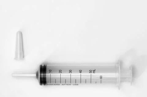 Large syringe with cap Stock Photos