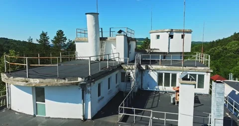 Large Terraces On Top Of Aged Structure Mountain Retreat Centre Clean Air Aerial Stock Footage 289412659