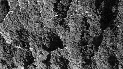 Large texture of a large black stone. Stock Photos