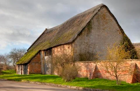 Large thatched barn, england Stock Photos