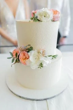 Large three-tiered cake at a wedding with decor delicious beautiful Stock Photos