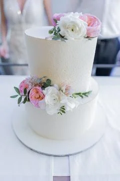 Large three-tiered cake at a wedding with decor delicious beautiful Stock Photos
