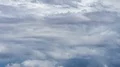 large thunderhead buildup over mountain range and rain time lapse HD-videomateriaal