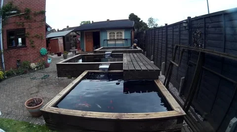 Large timber built garden ponds 1 Stock Footage 49740242