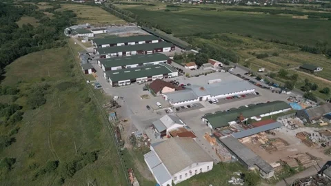 Large Timber Facility Surrounded by Nature – Aerial View Video stock 316582621