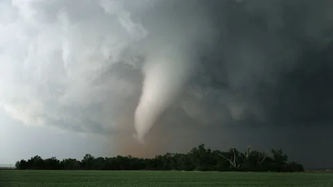 A Large Tornado Spins Over The Plains During A Severe Weather Outbreak Stock Footage 153499386