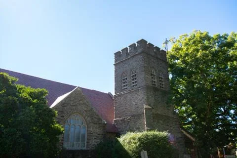 A Large Tower and Window on a Cobblestone Church Stock Photos