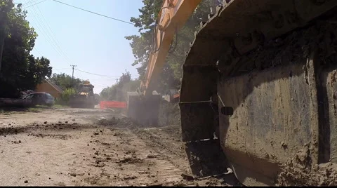 Large Tracked Excavator Digging at Construction Site Stock Footage 65903854