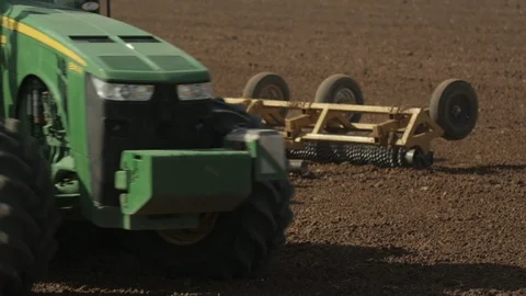 Large Tractor with Rig makes Tight Turn Stock Footage 94643185