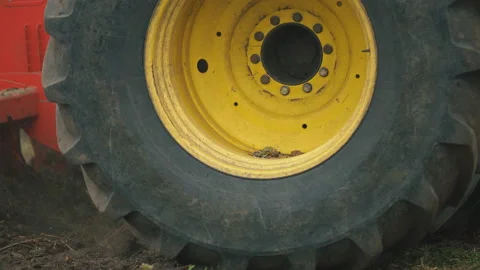 Large tractor wheels Video stock 130401151
