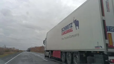 Large traffic jam of trucks standing at the border Stock Footage 255867304