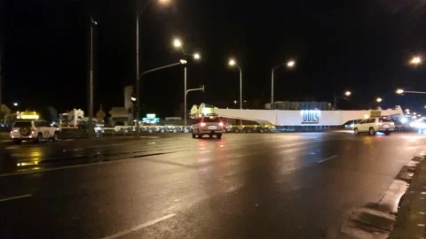 Large Transport Navigates Suburban Intersection Stock Footage 131724710