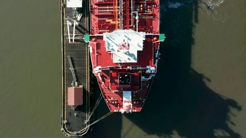 Large Transportation Ship Loading Cargo at a Fuel Depot Stock Footage 146647591