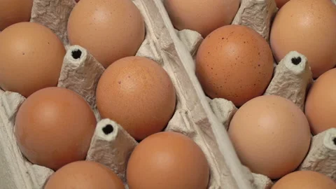 Large Tray of Cinnamon Eggs is Spinning Stock Footage 171373118