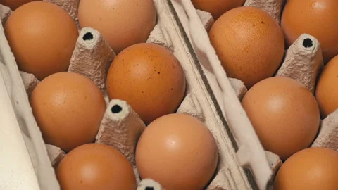 Large Tray of Cinnamon Eggs is Spinning Stock Footage 171419988