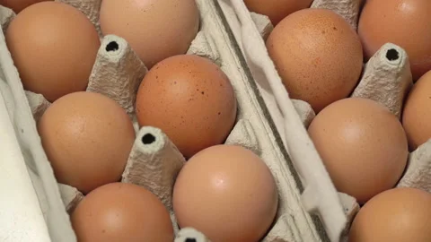 Large Tray of Cinnamon Eggs is Spinning Stock Footage 171468537