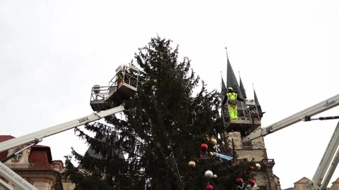 A large tree in the city is being decorated for the New Year holidays Stock Footage 297198336