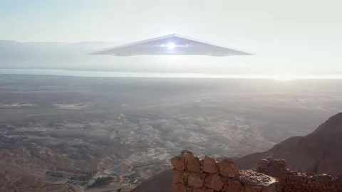 Large Triangle alien ufo over sea and desert mountains-Aerial Stock Footage 140180141